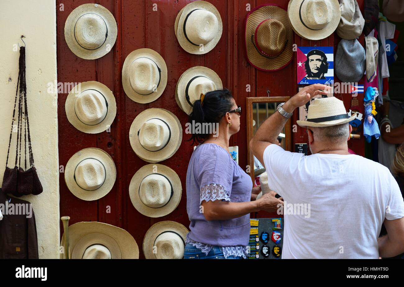 Tourist trying straw hat in Havana, Cuba Stock Photo Alamy