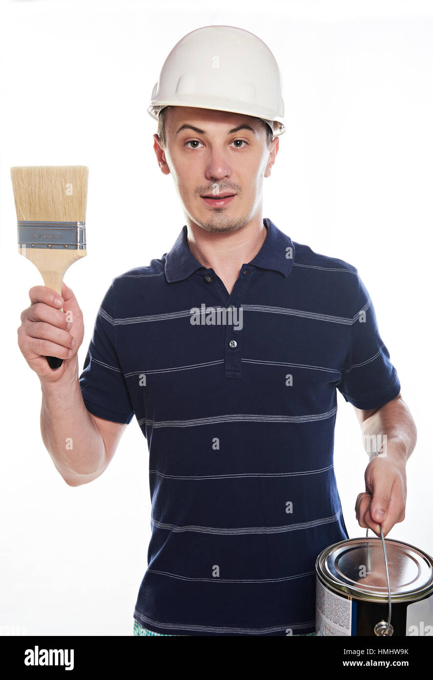 worker young man with paint brush isolated on white Stock Photo