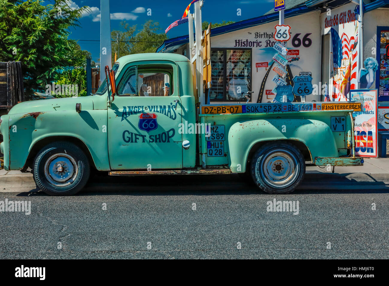 Green pickup truck Main Street, Seligman on historic Route 66, Arizona, USA, July 22, 2016 Stock Photo