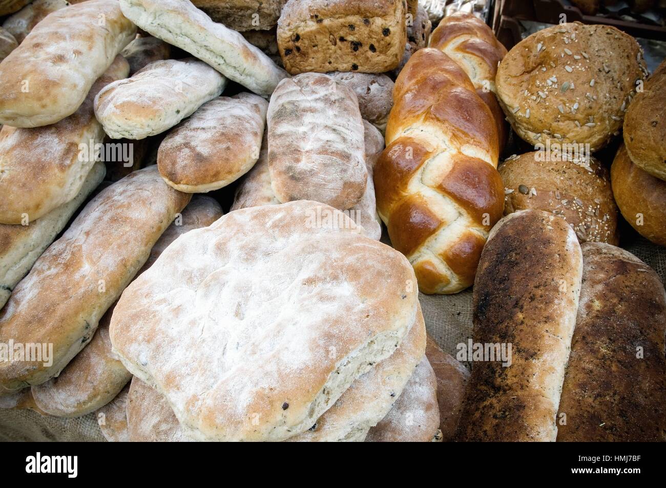 different types of bread in a bakery. Chapatas, Wholemeal bread, Organic, Seeded, Granary bread