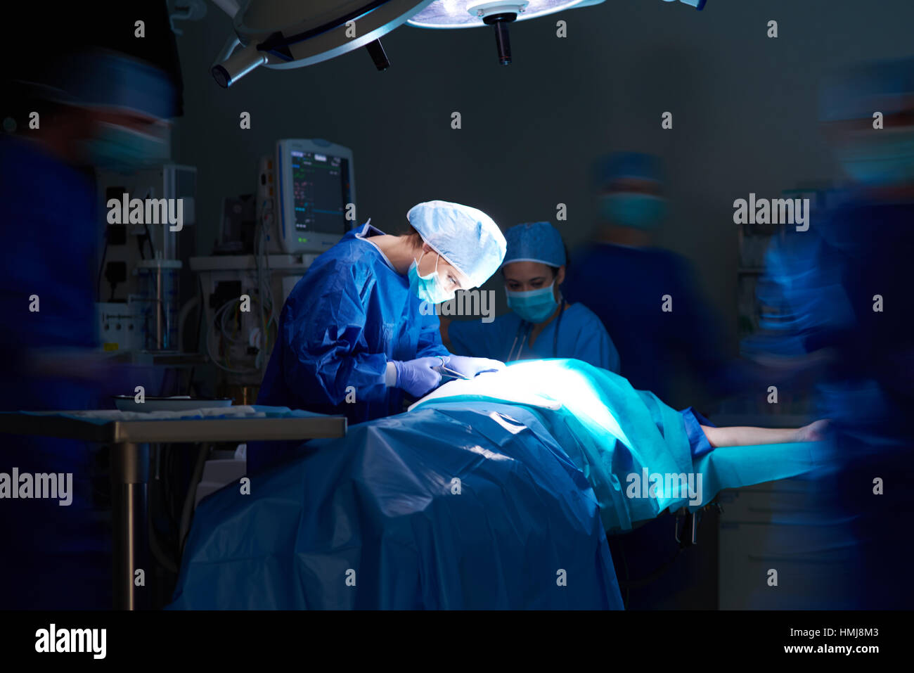 Dark operating room and hospital staff Stock Photo Alamy