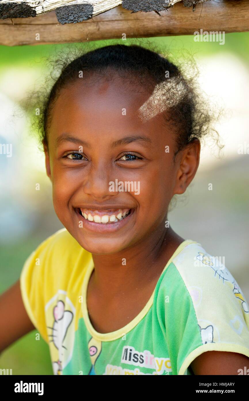 Portrait of a little smiling girl in Raja Empat,Indonesia Stock Photo
