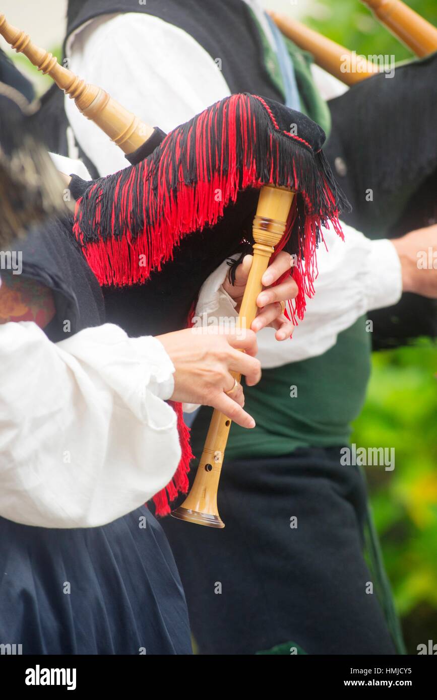 Bagpipes band parade through the streets of Muros del Nalon, Asturias, Spain, Europe Stock Photo