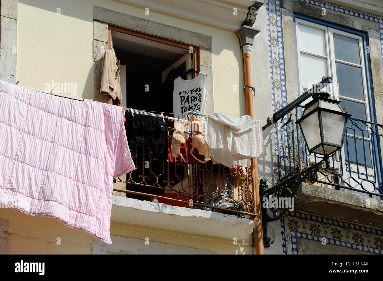Drying of the linen on the balcony, Rua da Mouraria, Alfama, Lisboa, Lisbon, Portugal, Europe Stock Photo