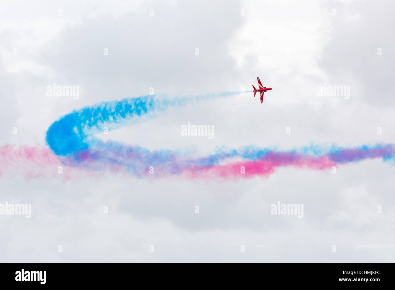 Bournemouth, Dorset, ENGLAND - August 21, 2016: Bournemouth Air Festival 2016 - One Hawk T Red Arrow jet perform aerobatics and mid air stunts across  Stock Photo