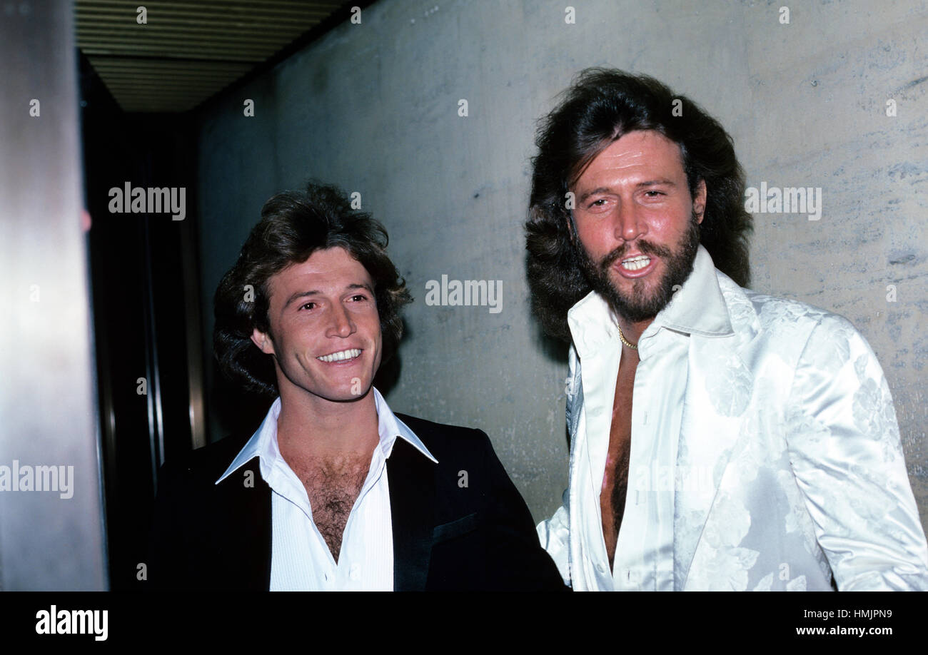 Andy Gibb and Barry Gibb of the Bee Gees are photographed at a Grammy Party held at the Four Seasons in the 1990s. Stock Photo