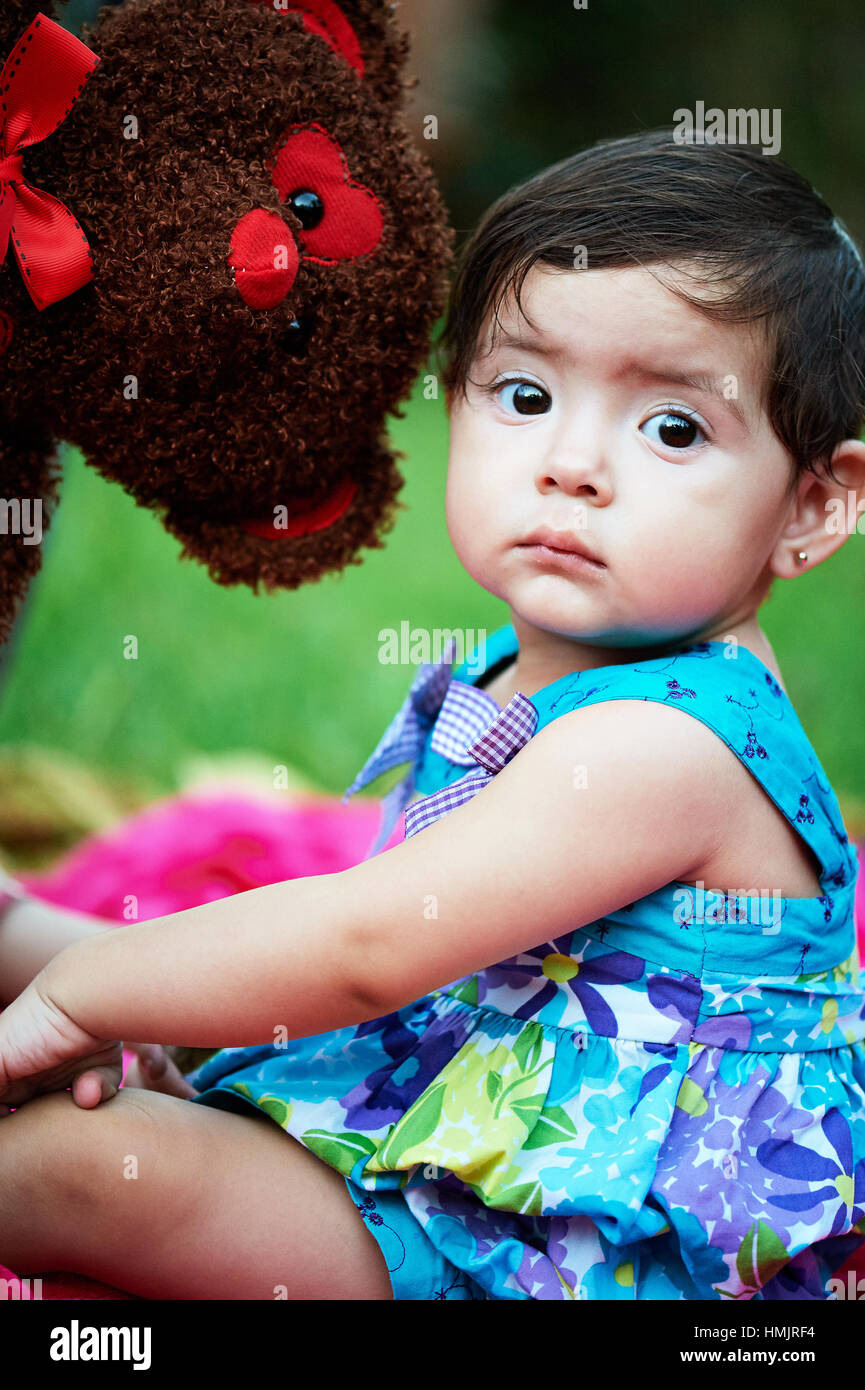 Small girl and teddy bear hi-res stock photography and images - Alamy