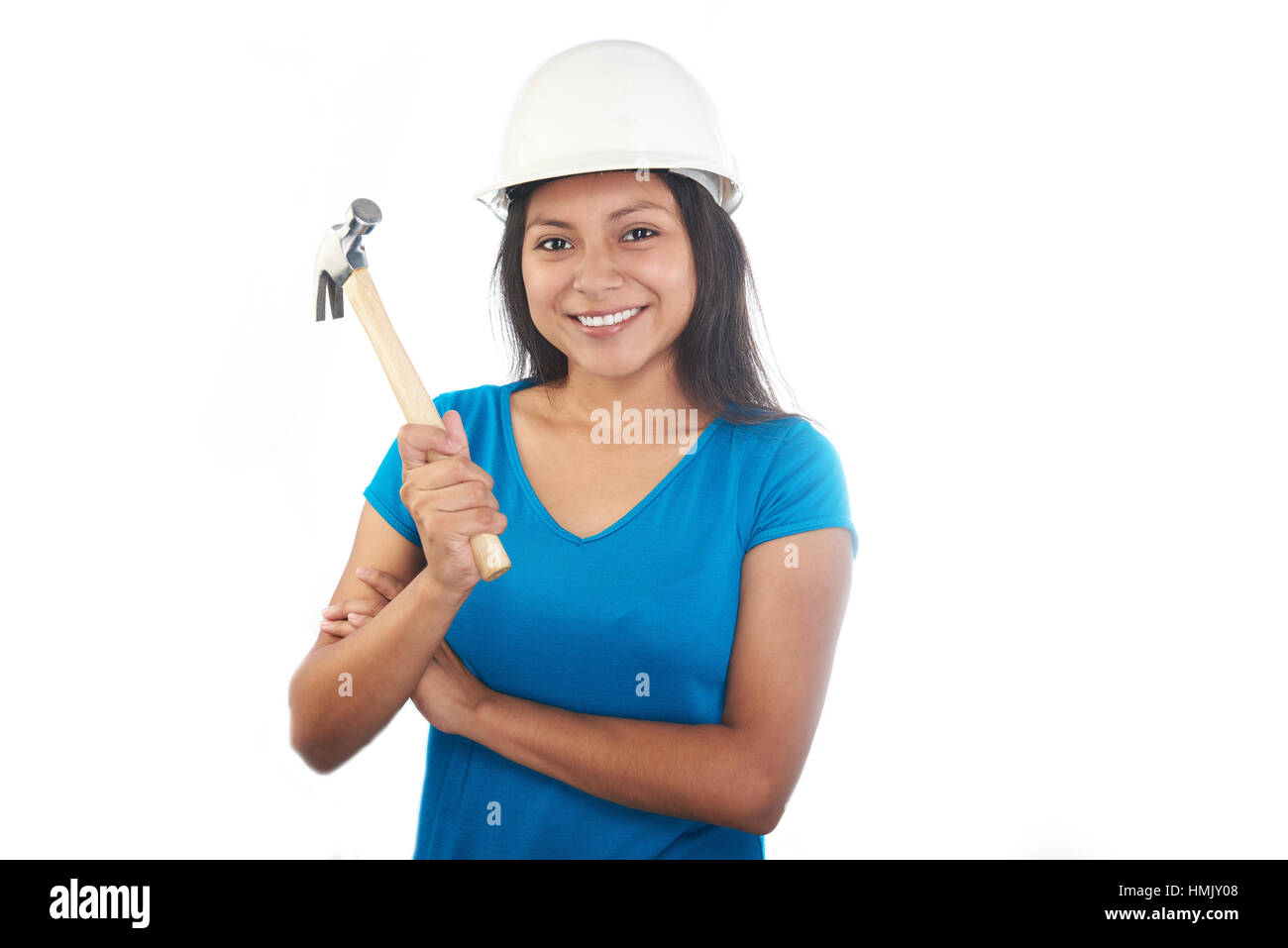 Girl with construction hat and hammer on a white background Stock Photo