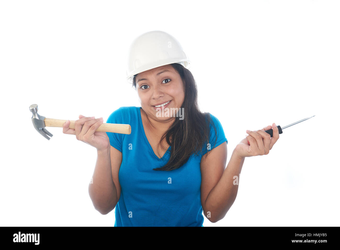 girl not knowing what to do with construction tools on a white background Stock Photo