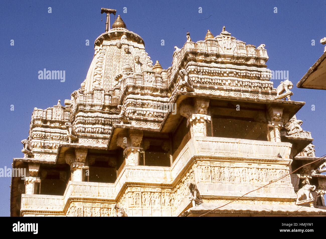Detail view of elephant sculptures and embellished carvings decorating the walls and peaked roofs of the Jagdish Temple, Udaipur, Rajasthan, located in northwestern India, November, 1973. Stock Photo