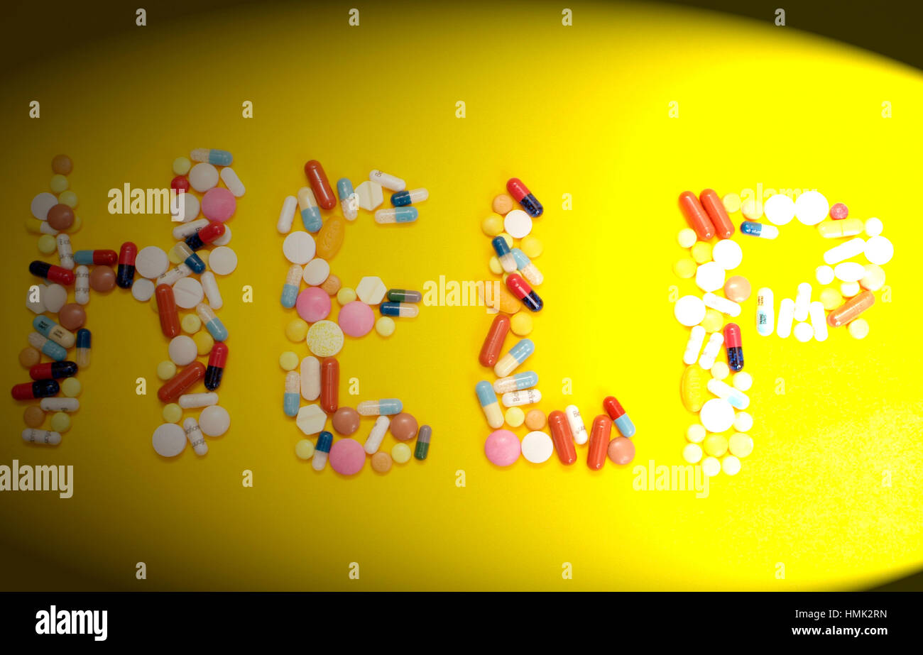 Schriftzug aus Tabletten, Symbolbild Tablettensucht Stock Photo
