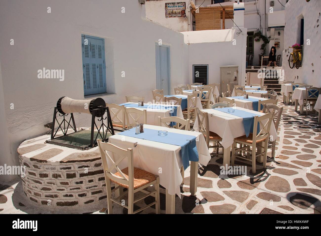 Tables And Chairs Of An Open Air Restaurant In The Town