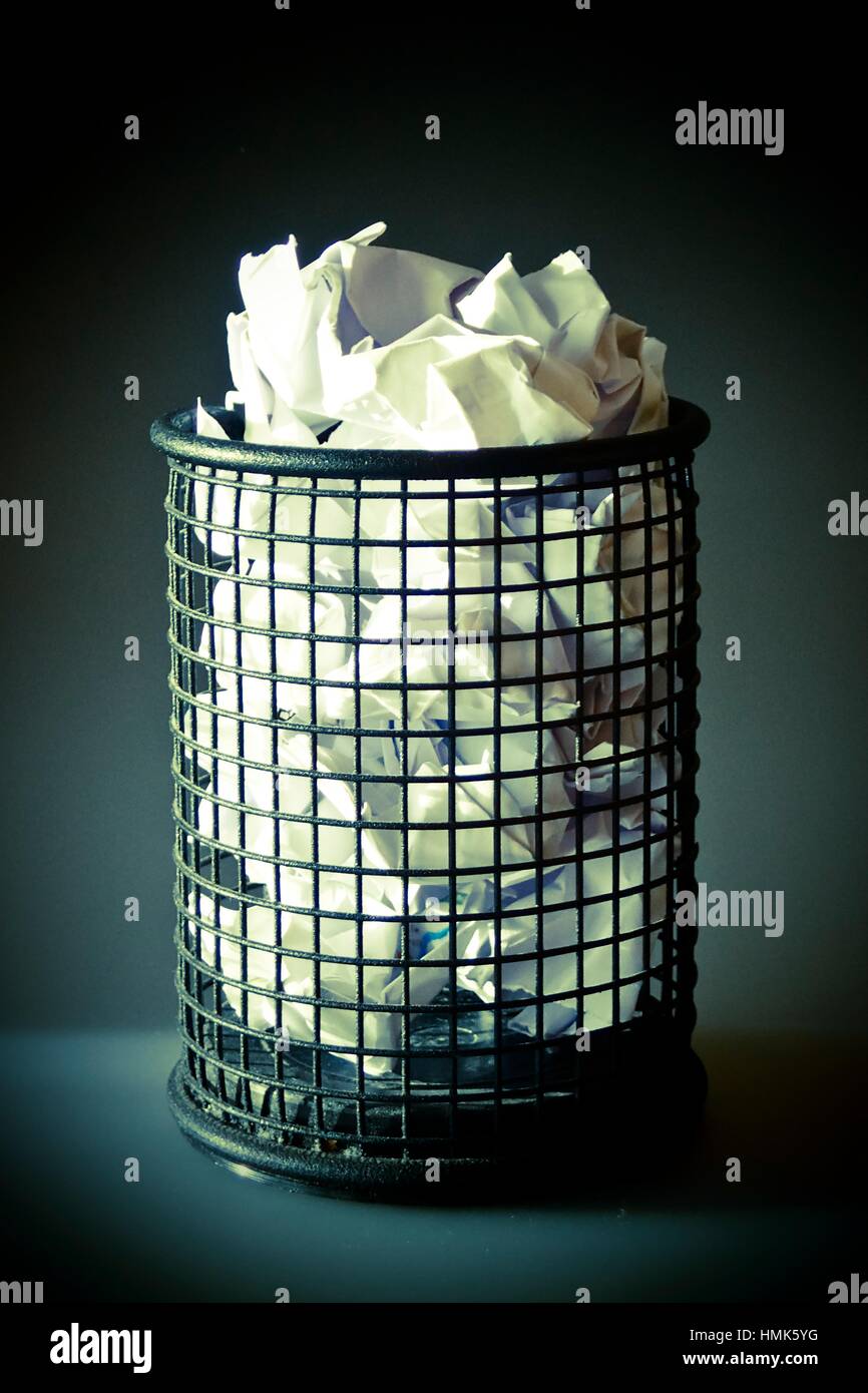 Trash bin with paper inside. Bin office full of papers Stock Photo Alamy