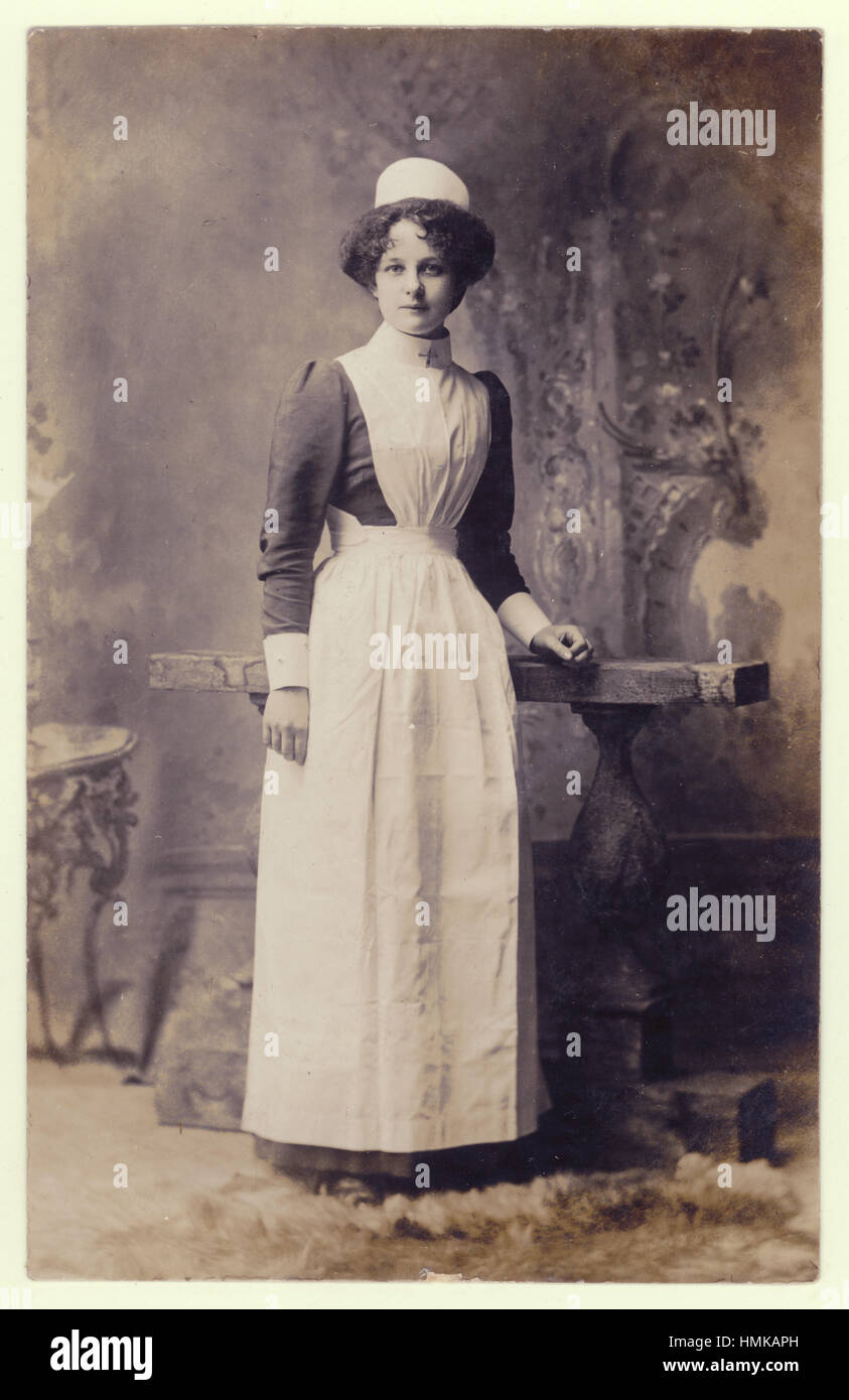 Studio occupational portrait portraits of attractive pretty Edwardian servant housemaid or nursemaid / nurse maid / nanny circa 1905, Wooton, Bedfordshire, England, U.K. Stock Photo
