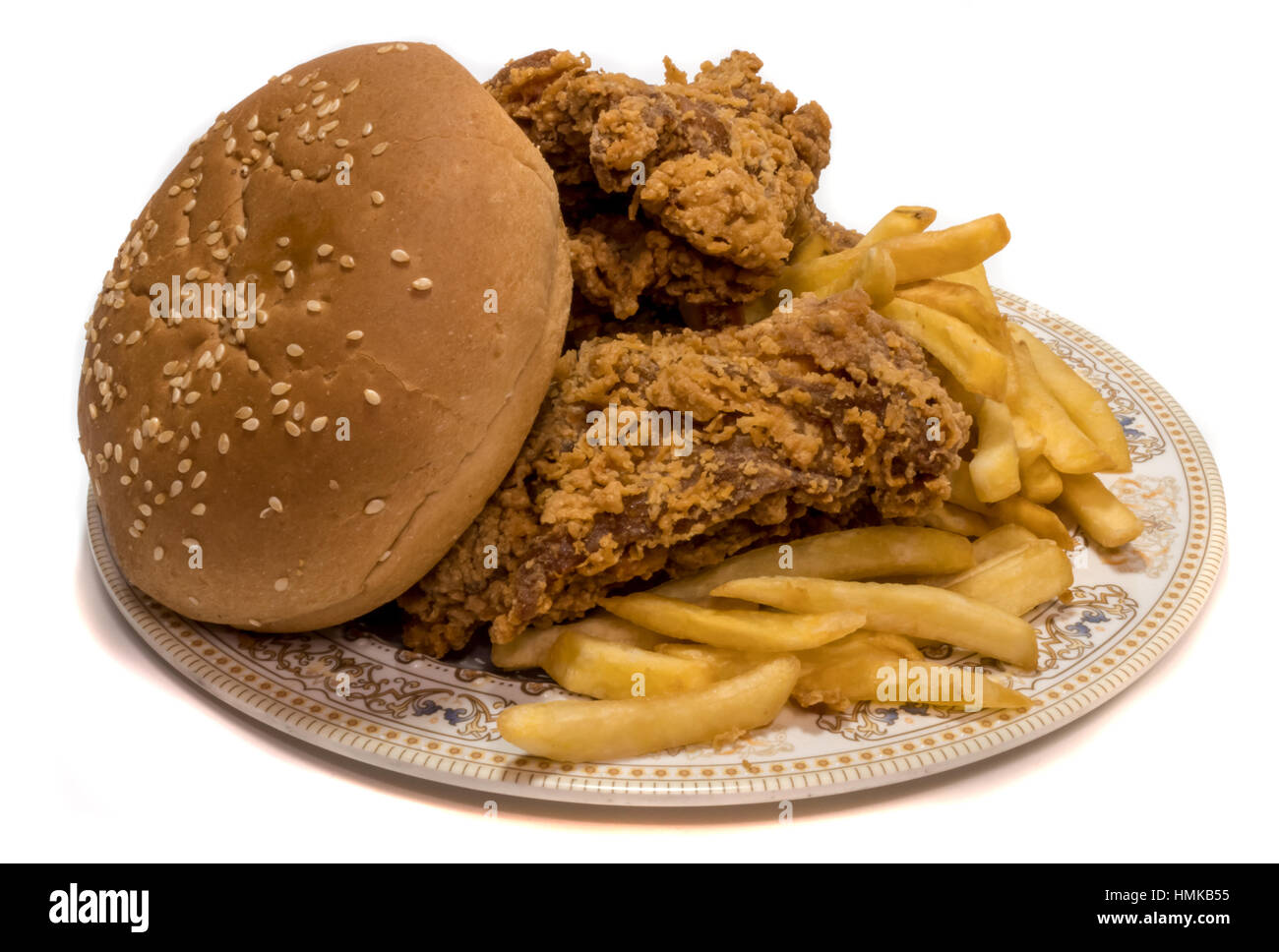 Tasty Fried potatoes with deep fried crunchy spicy chicken delicious Stock Photo
