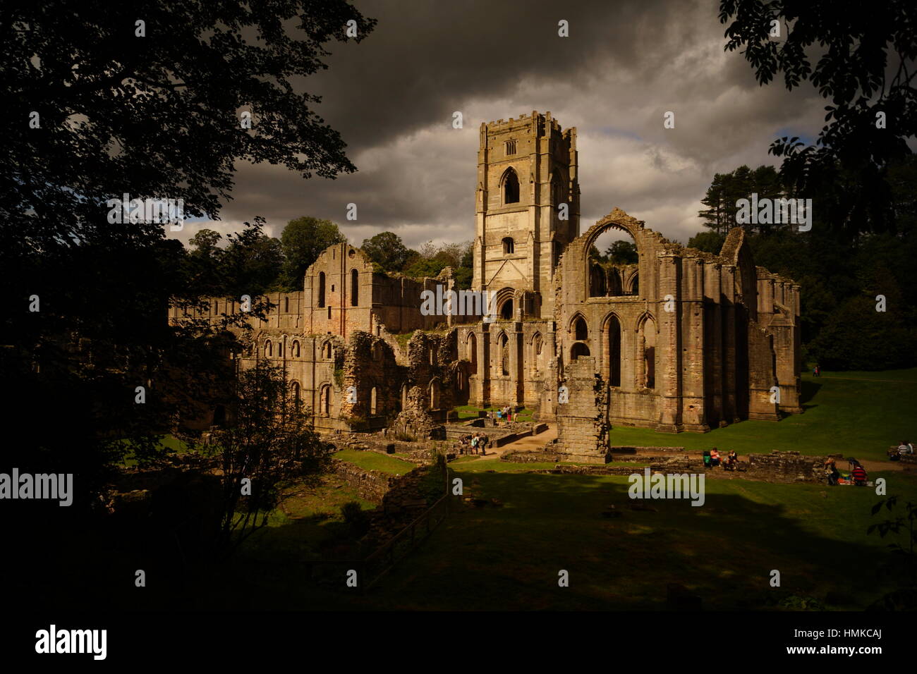 Fountains Abbey on a dark summer day in August Stock Photo