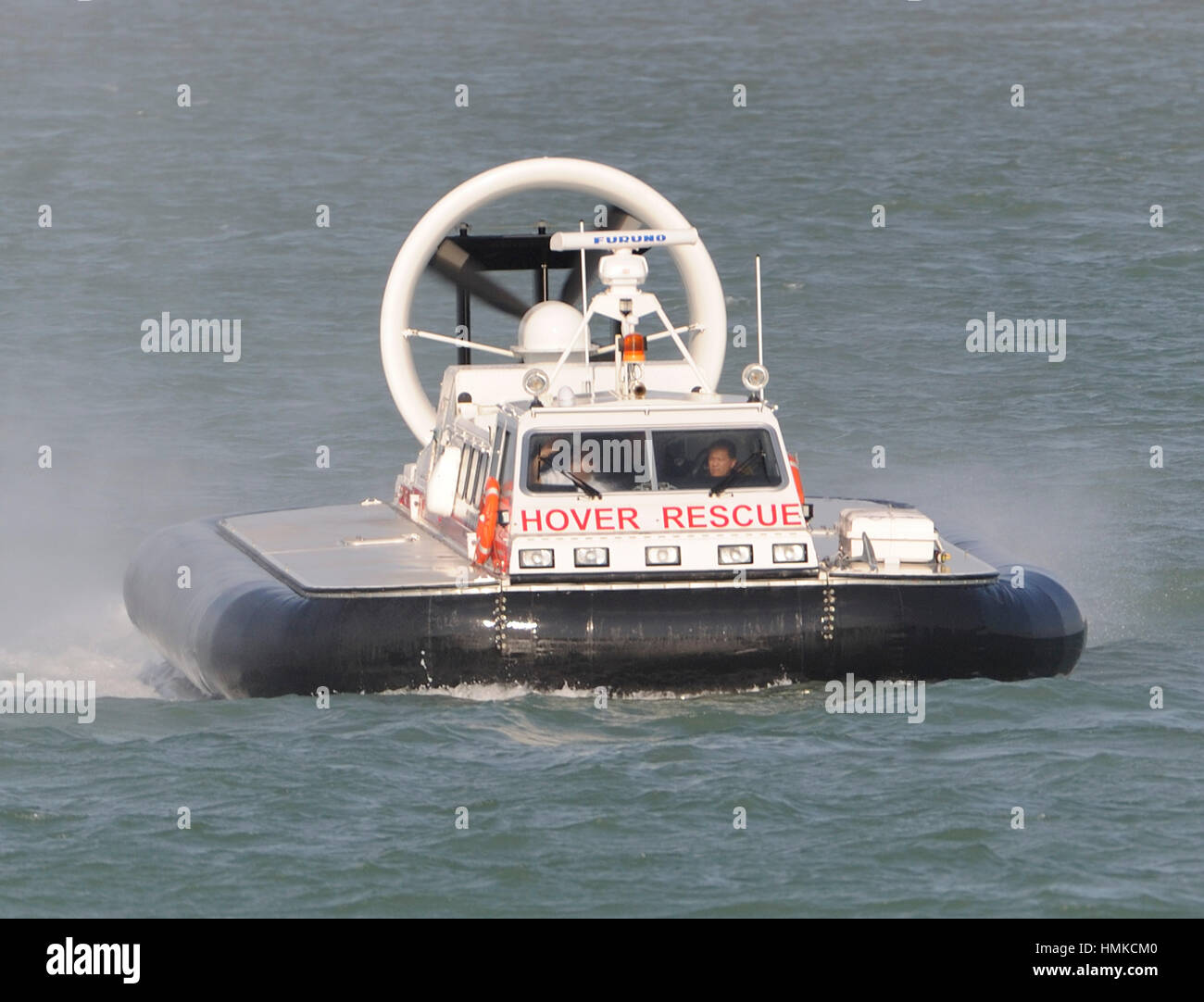 Changi-Airport Emergency Service brand-new Griffon Hoverwork 8000TD rescue hovercraft flying across sea Straits Singapore Stock Photo