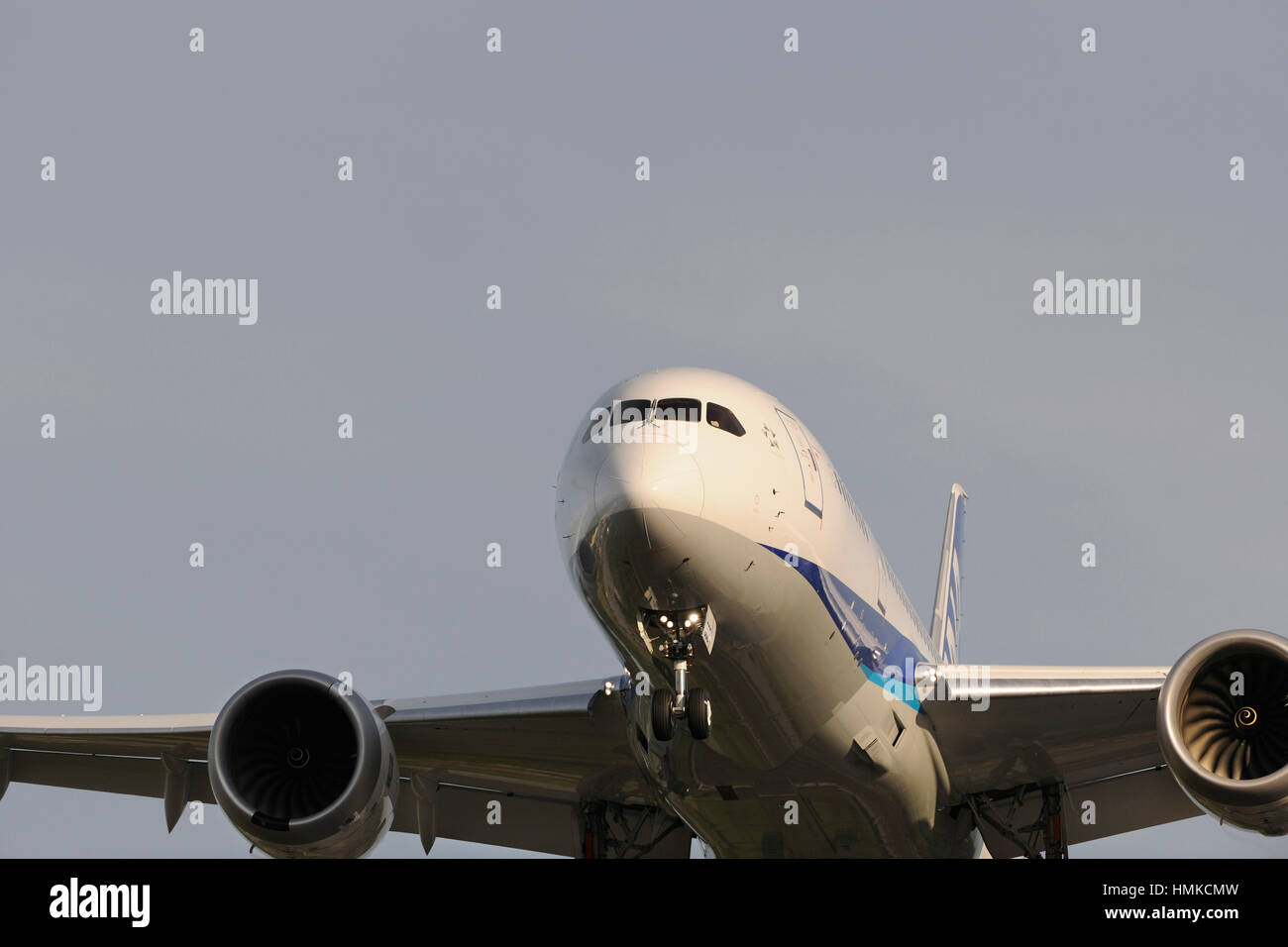 nose of ANA All Nippon Airways Boeing 787-8 Dreamliner on final-approach Stock Photo