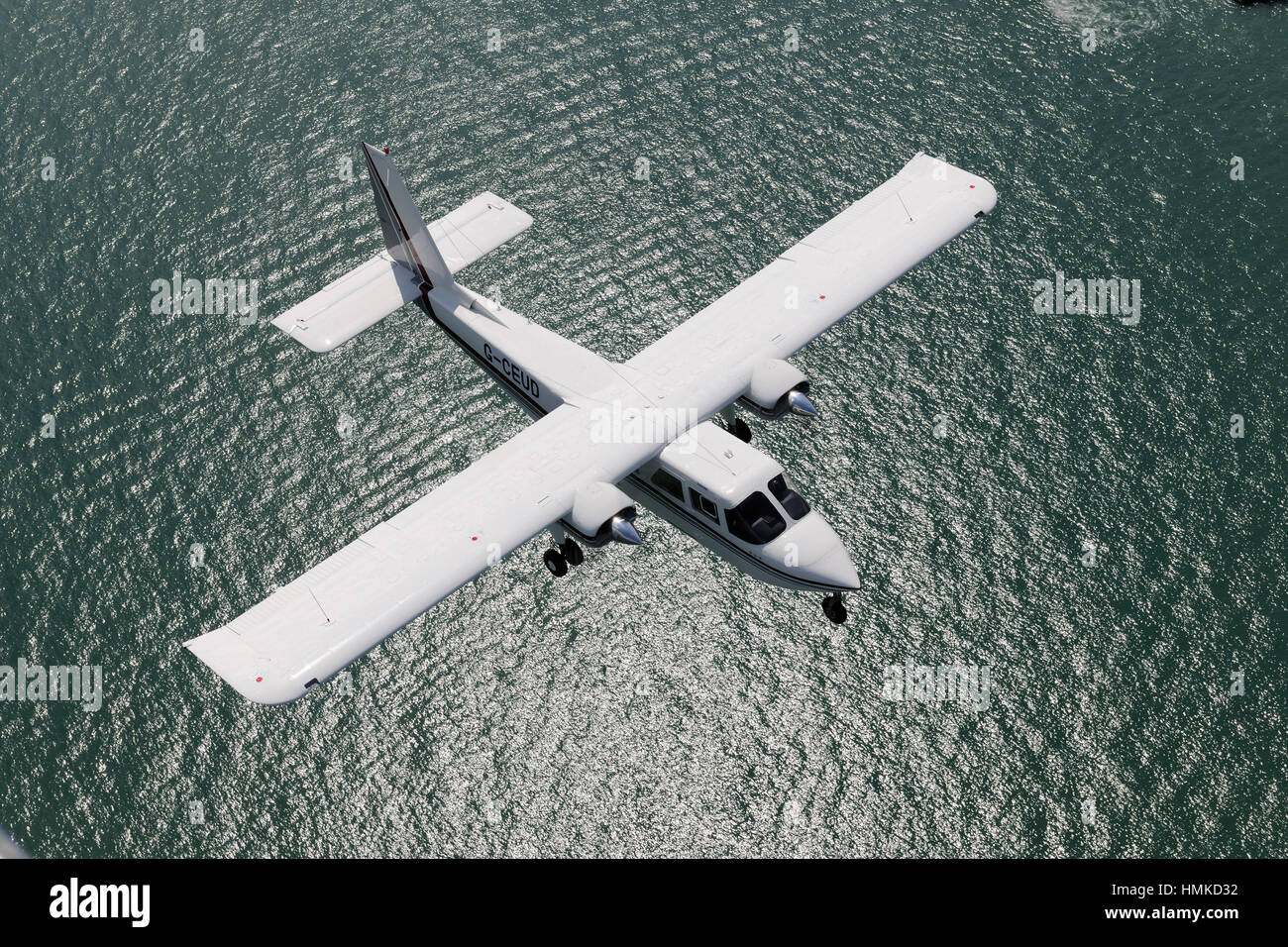 Australia - Queensland Police Britten Norman BN-2B-20 Islander flying over the sea Stock Photo