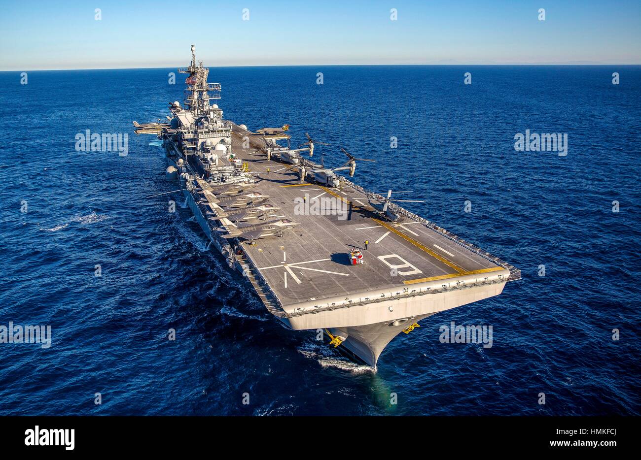 PACIFIC OCEAN -- The USS America, (LHA 6), houses 12 F35-B Lightning II aircraft off the coast of California, November 18, 2016. USS America is a new Stock Photo