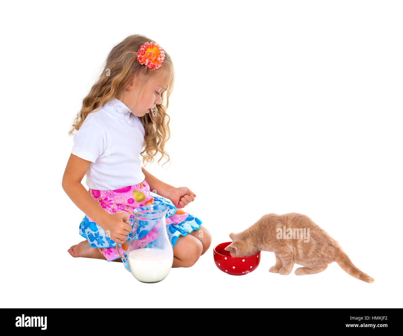 Cute Little Girl Feeding Red Cat With Milk Isolated On White Background Stock Photo Alamy