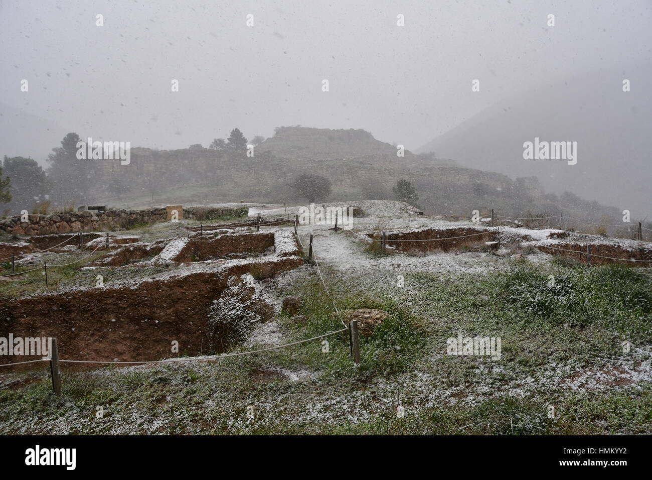 A general view over snow falling in the archaeological site of Mycenae, Greece, 07 January 2017. A cold wave across Greece causing temperatures to dro Stock Photo