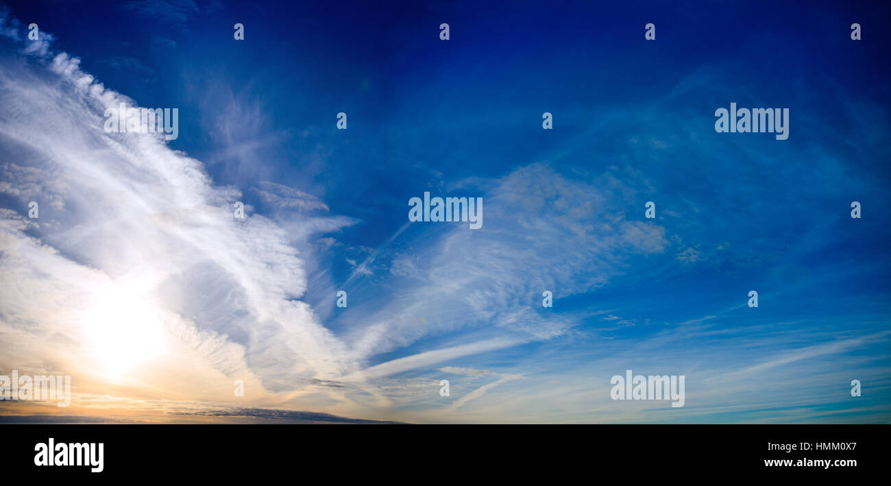 white fluffy clouds in the blue sky Stock Photo - Alamy
