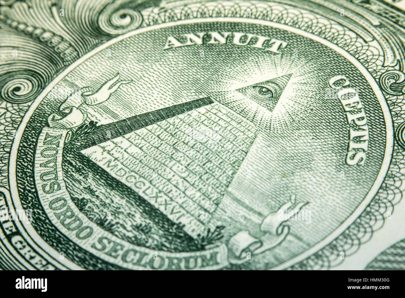 Macro closeup eye pyramid on back of dollar bill Stock Photo
