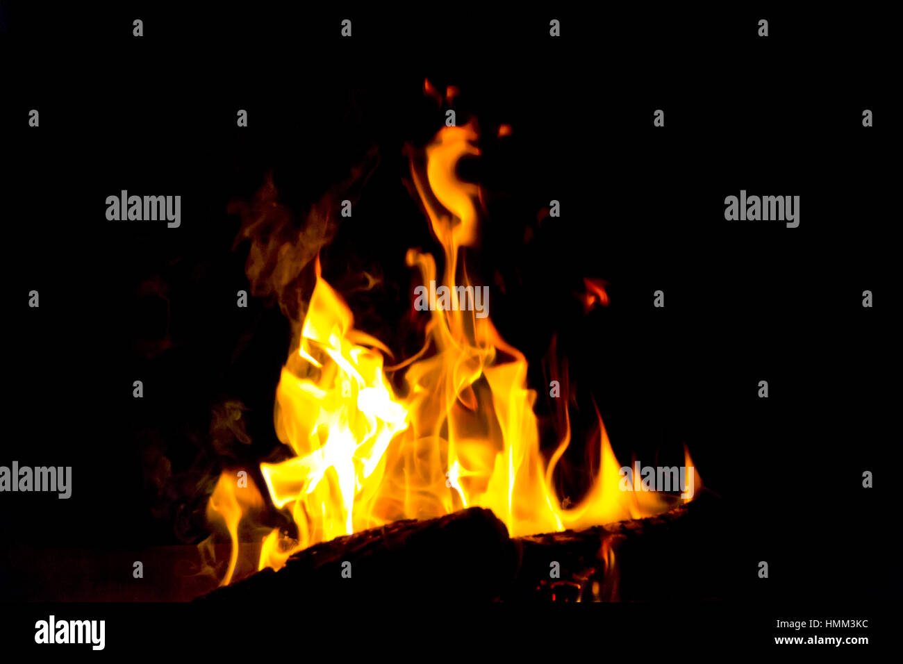 Photo of red fire flame on black background Stock Photo - Alamy