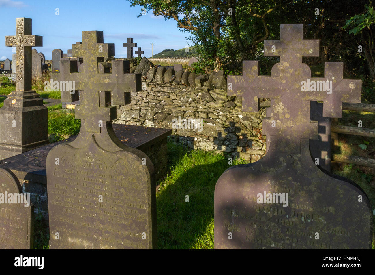 Welsh Church graveyard scene with many stone crosses. Stock Photo
