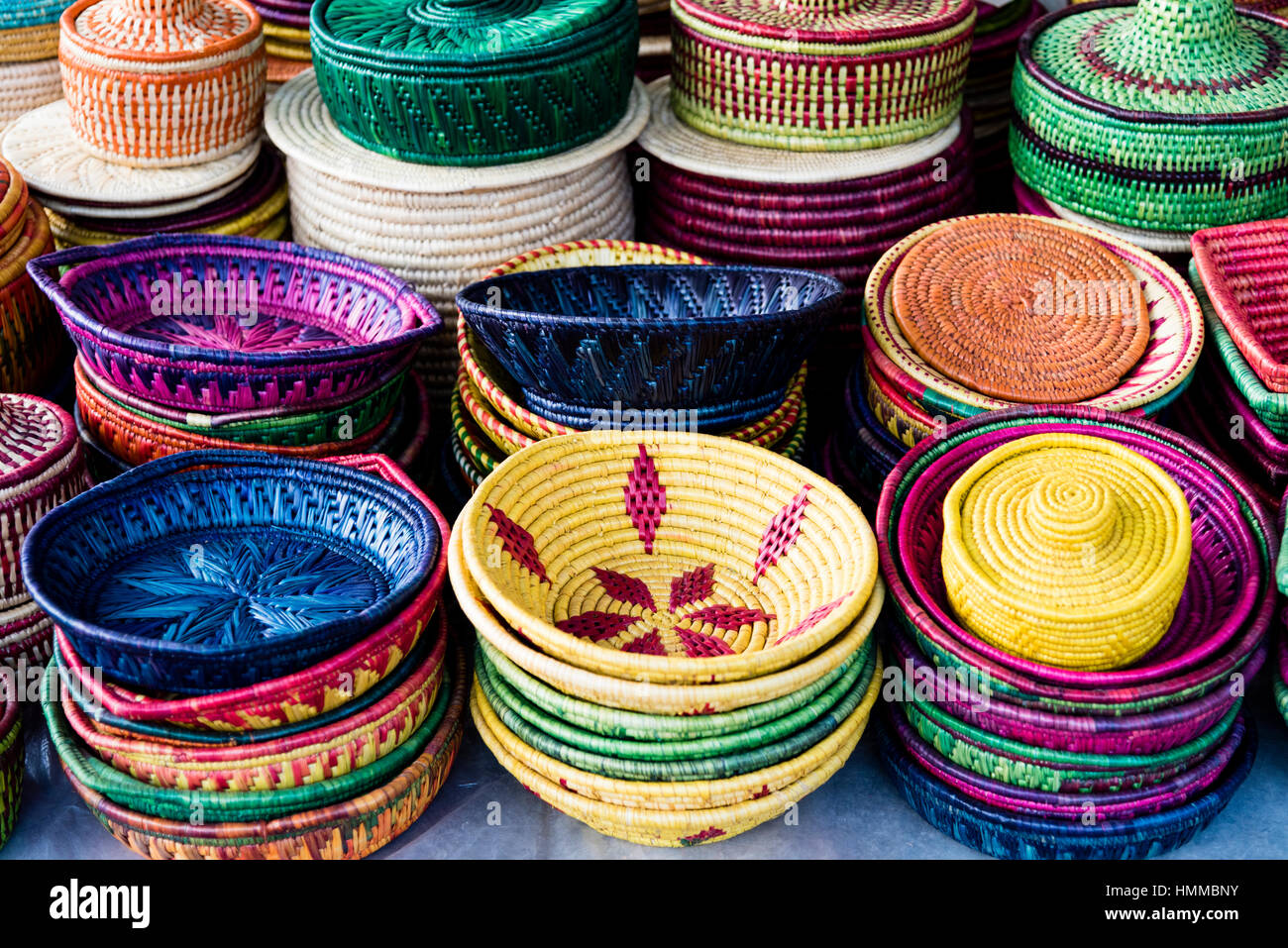 Beautiful jute baskets of different colours for sale at a shop in India