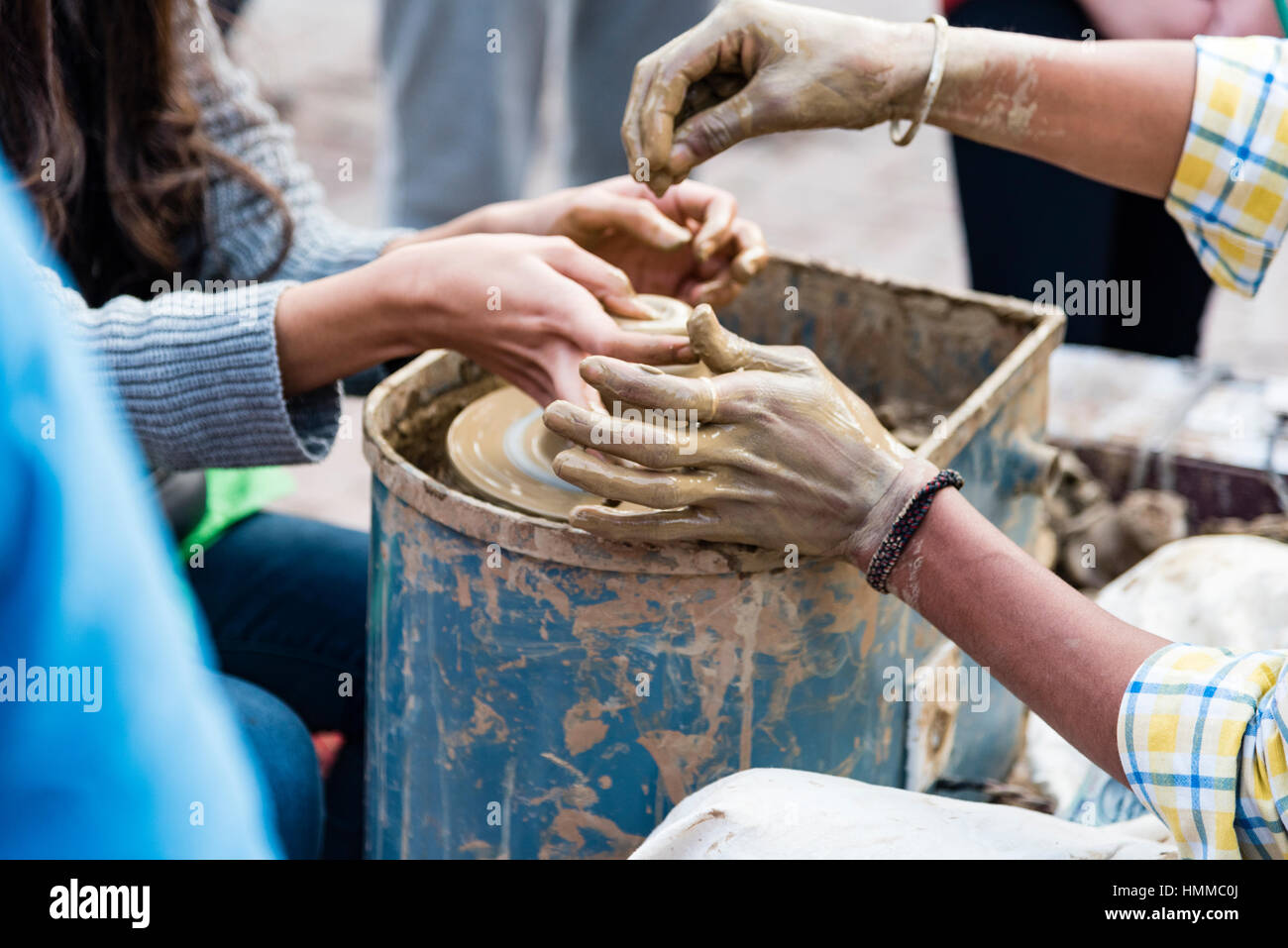 A potter giving pottery making lesson Stock Photo Alamy