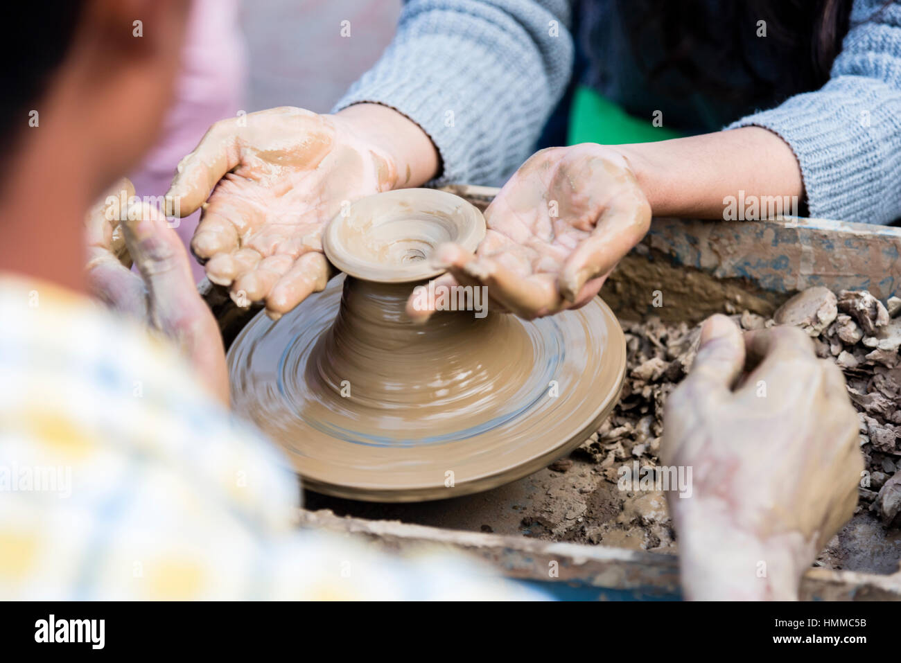 A potter giving pottery making lesson Stock Photo Alamy