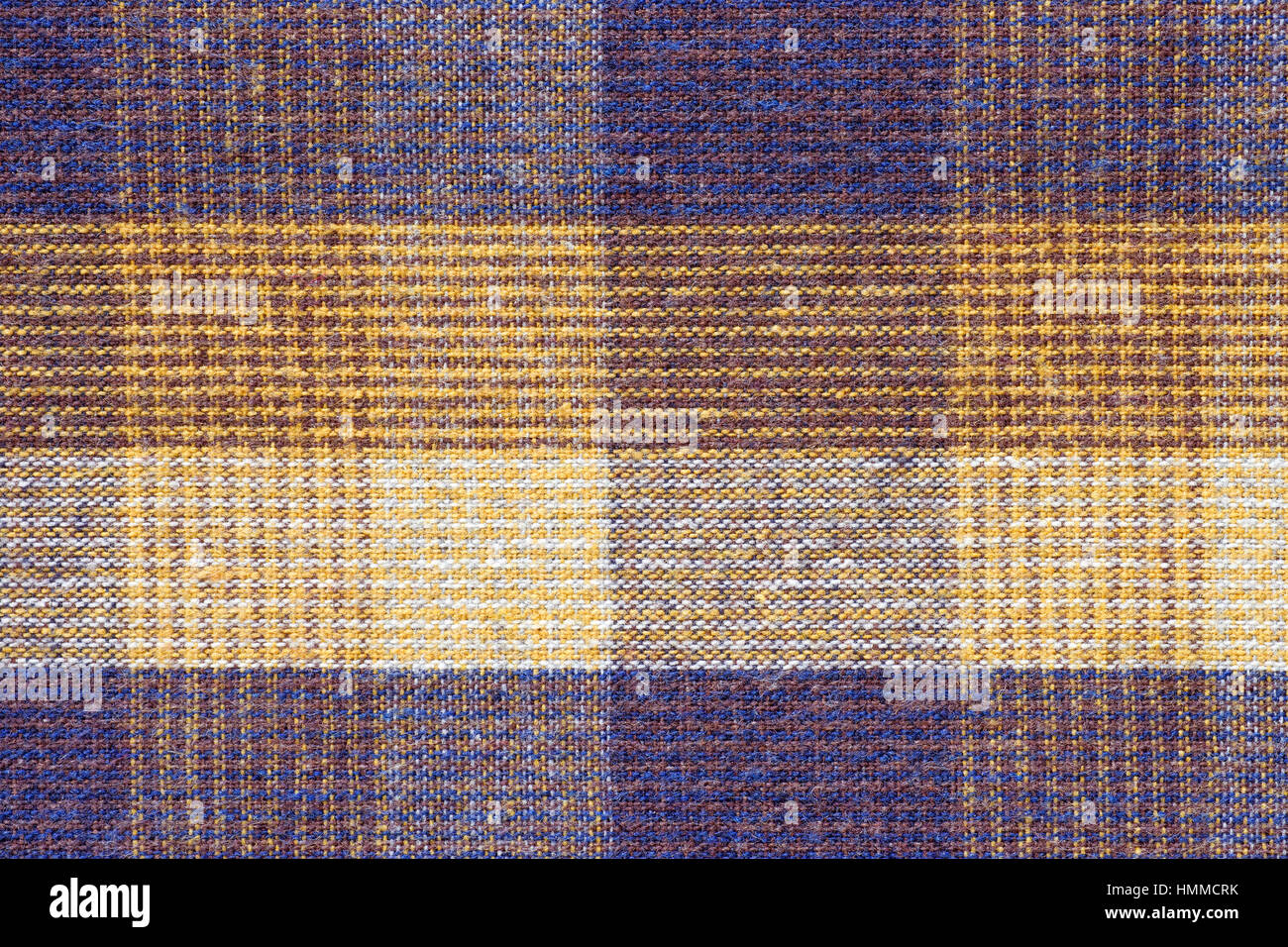 Blue and yellow plaid fabric close up. Background and texture Stock