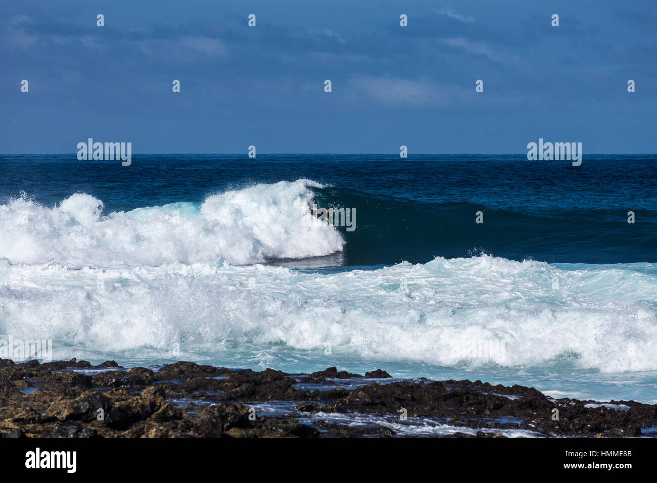 Bodyboarders at Punta Blanca in high waves on the west coast of Tenerife, Canary Islands, Spain Stock Photo