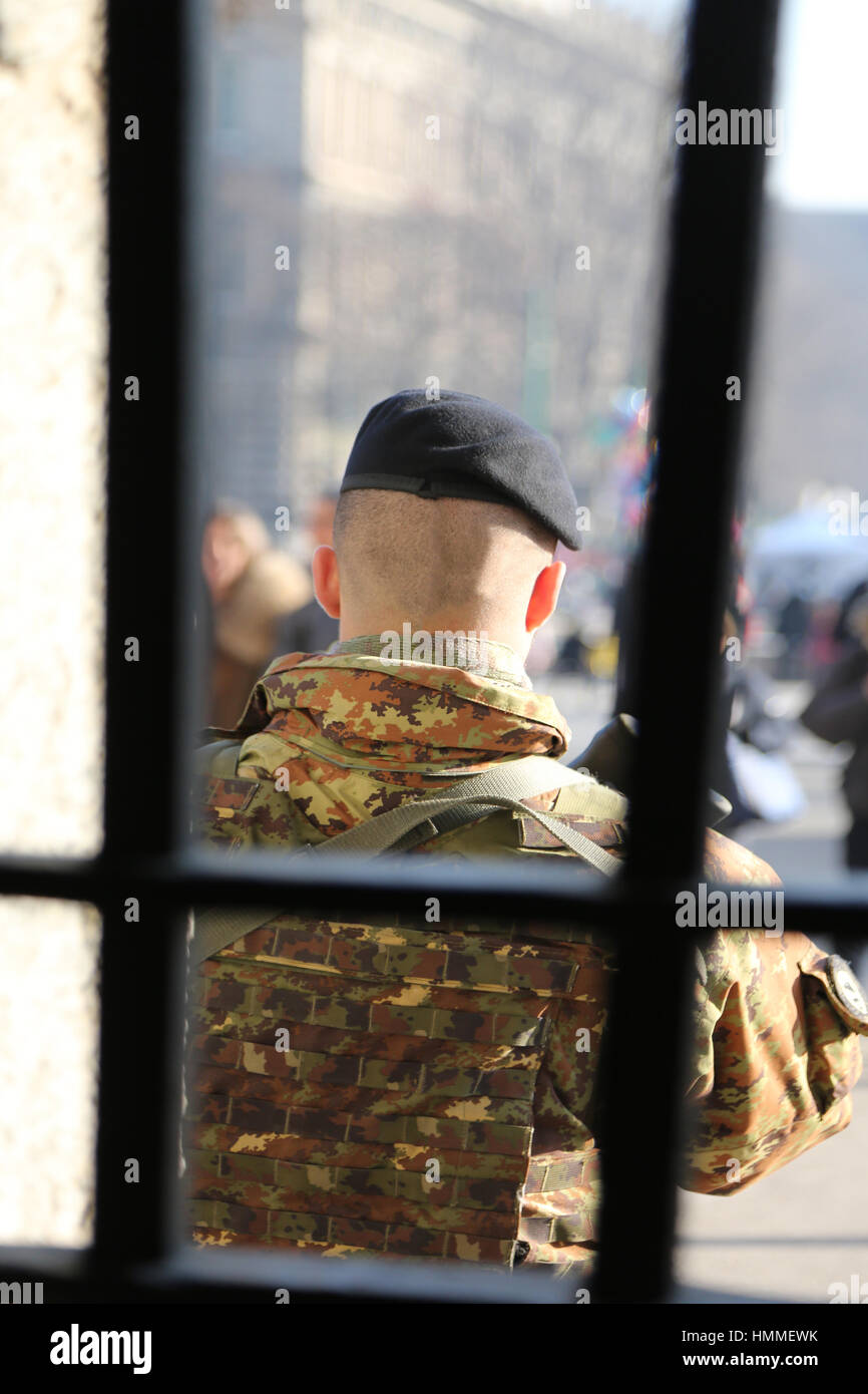 Army soldier guardian with camouflage uniform outside a prison Stock Photo