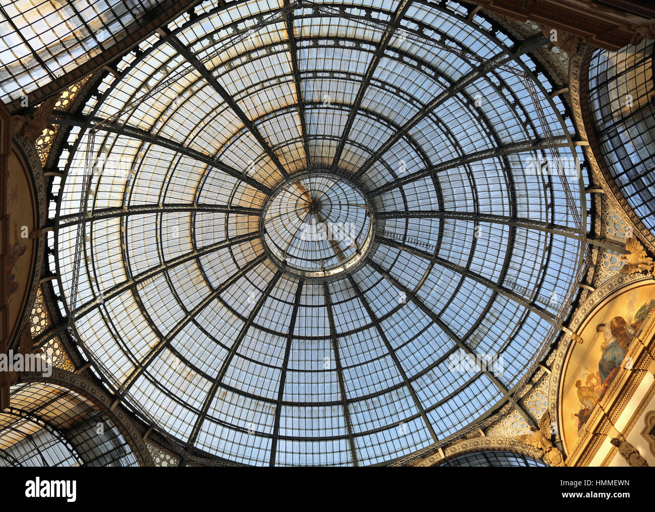 Inside the fantastic gallery dedicated to Vittorio Emanuele II King of Italy with a glass roof and steel and artistic decorations in Milan Italy Stock Photo