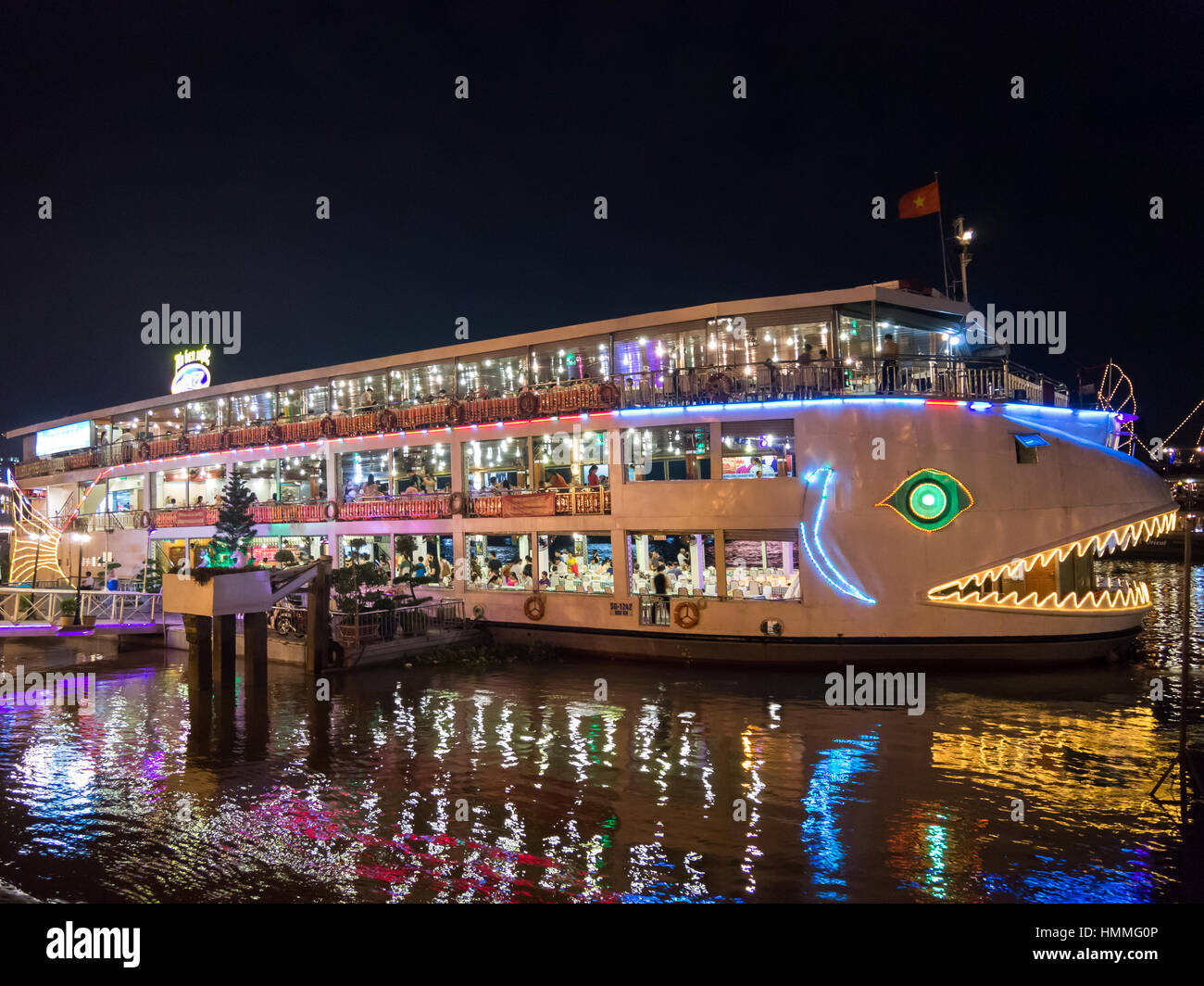 Floating restaurant at Saigon River in Ho Chi Minh, Vietnam. Stock Photo