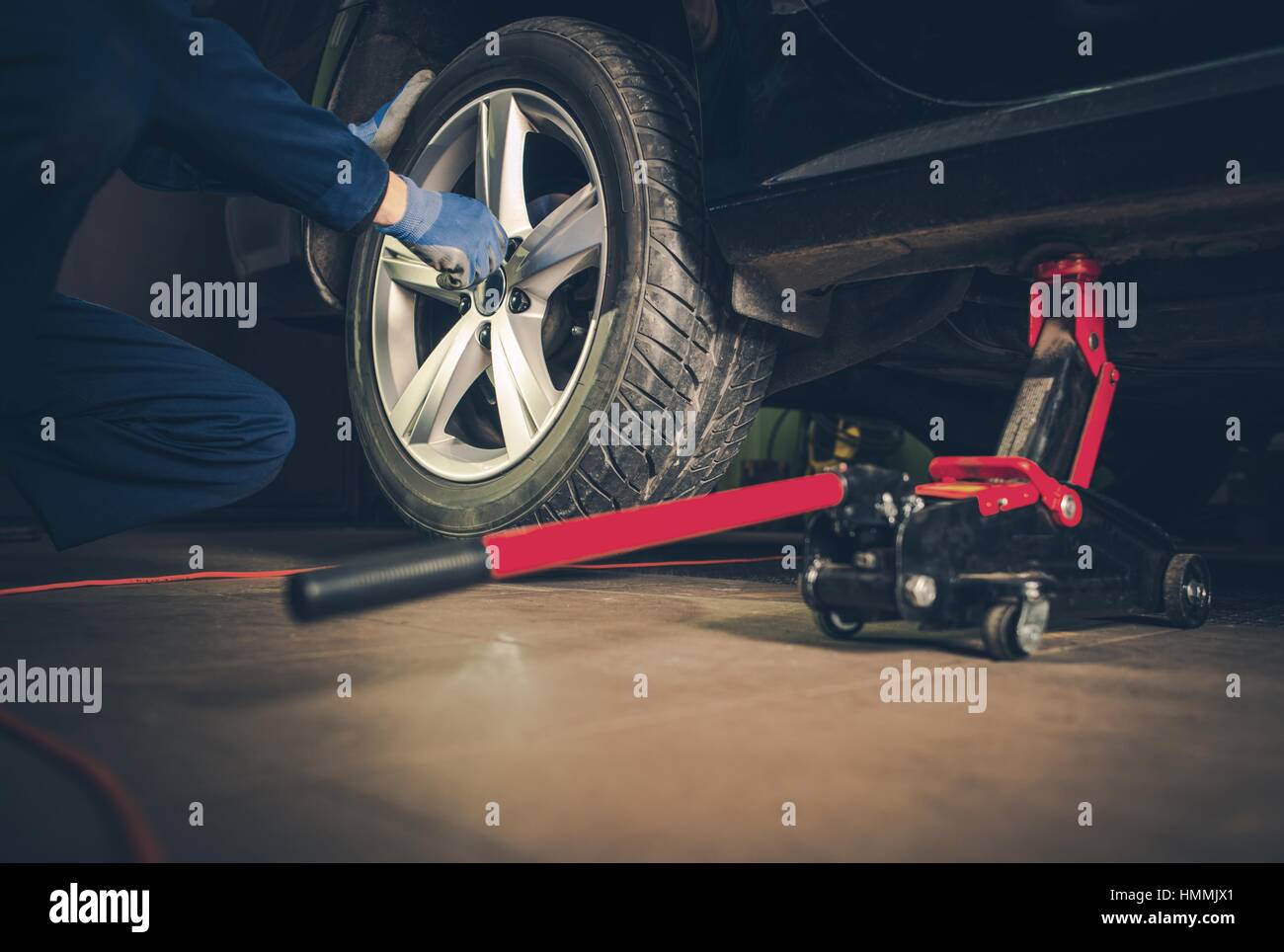 Auto Service. Car Tire Replacement and Maintenance Stock Photo - Alamy