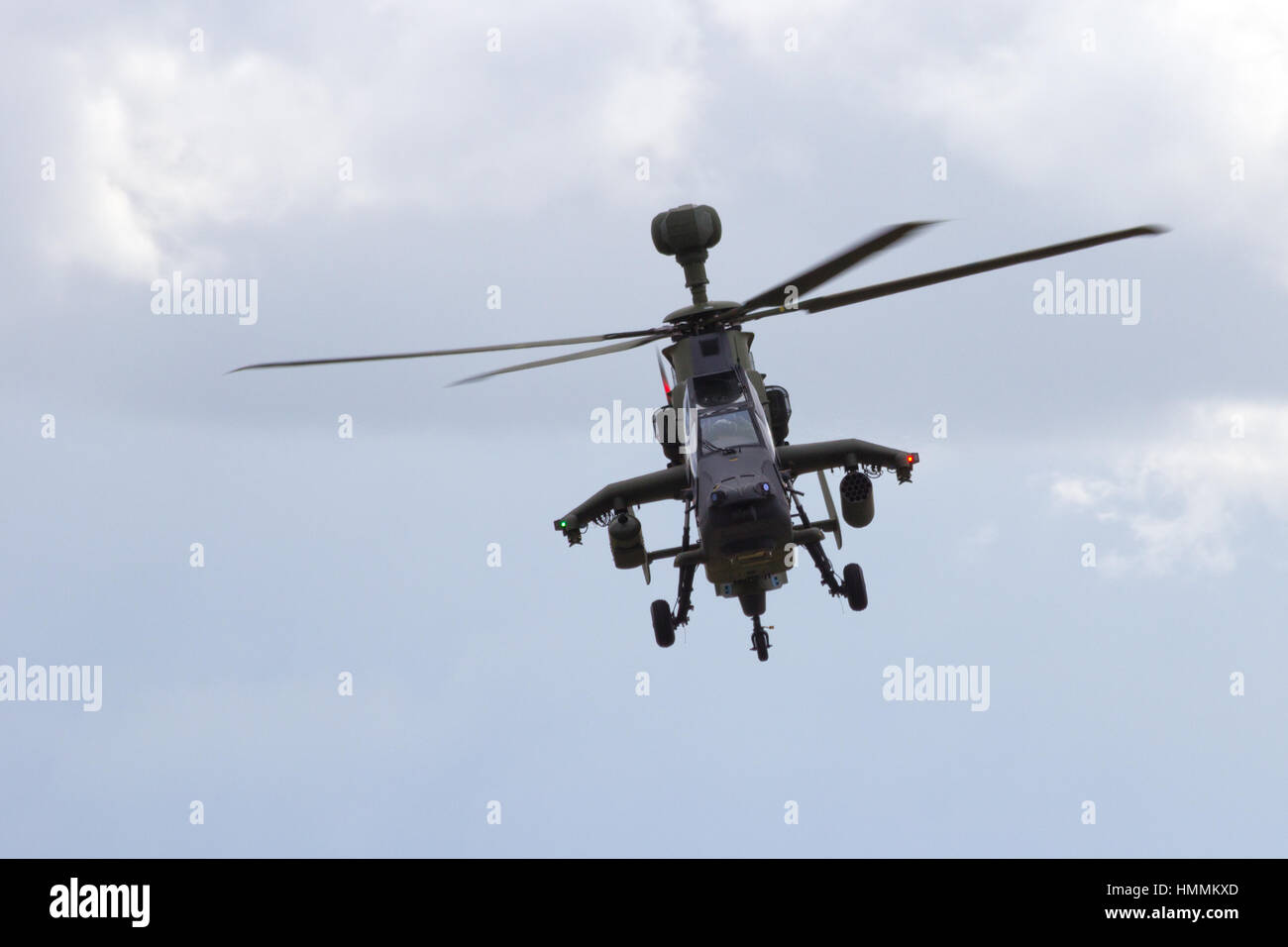 LAAGE, GERMANY - AUG 23, 2014: Eurocopter EC665 Tiger attack helicopter flying during a display at the Laage airbase open house. Stock Photo