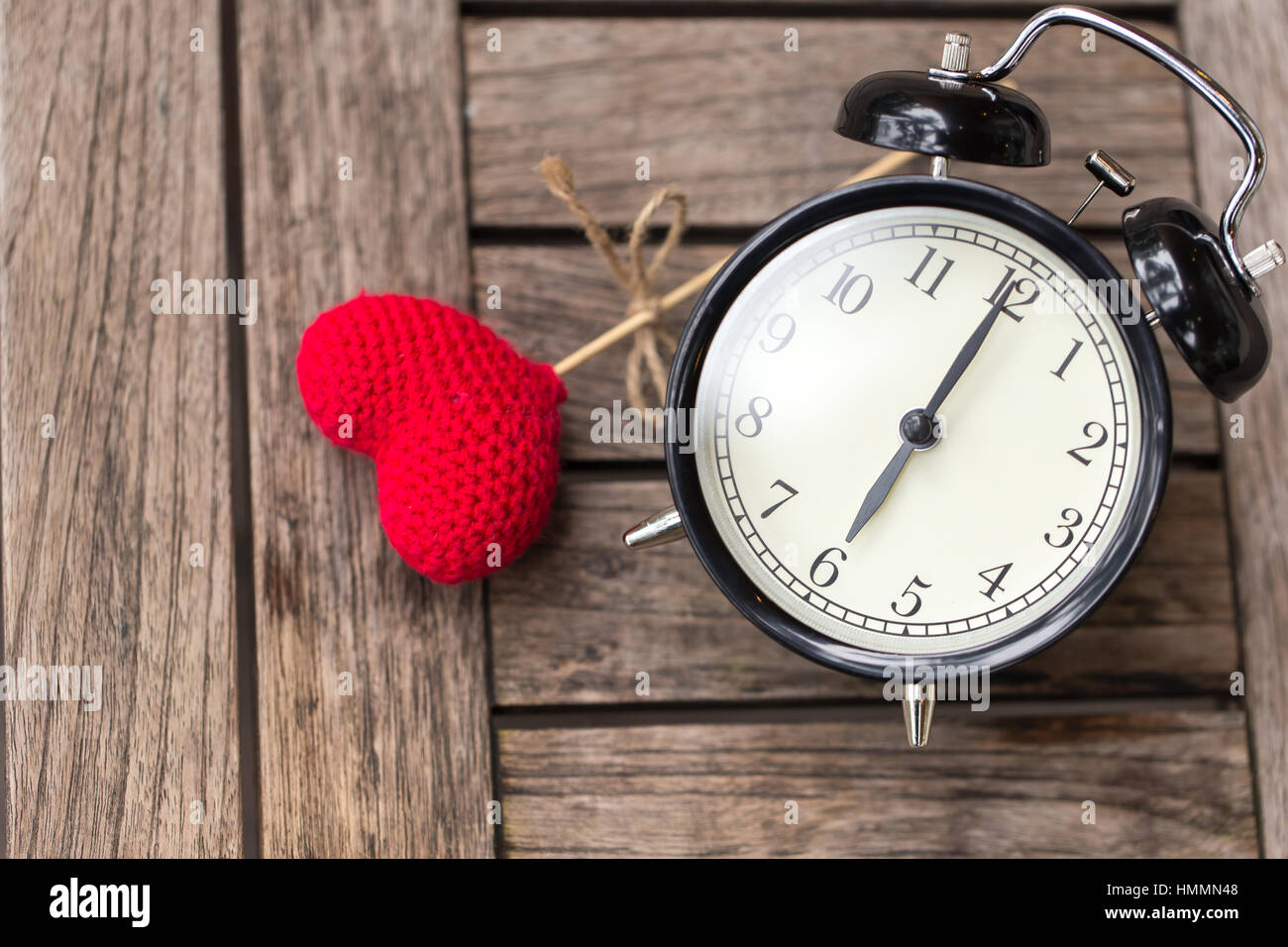 6 o'clock of retro vintage clock with red heart and sun light morning,  loving time or memory times Stock Photo - Alamy