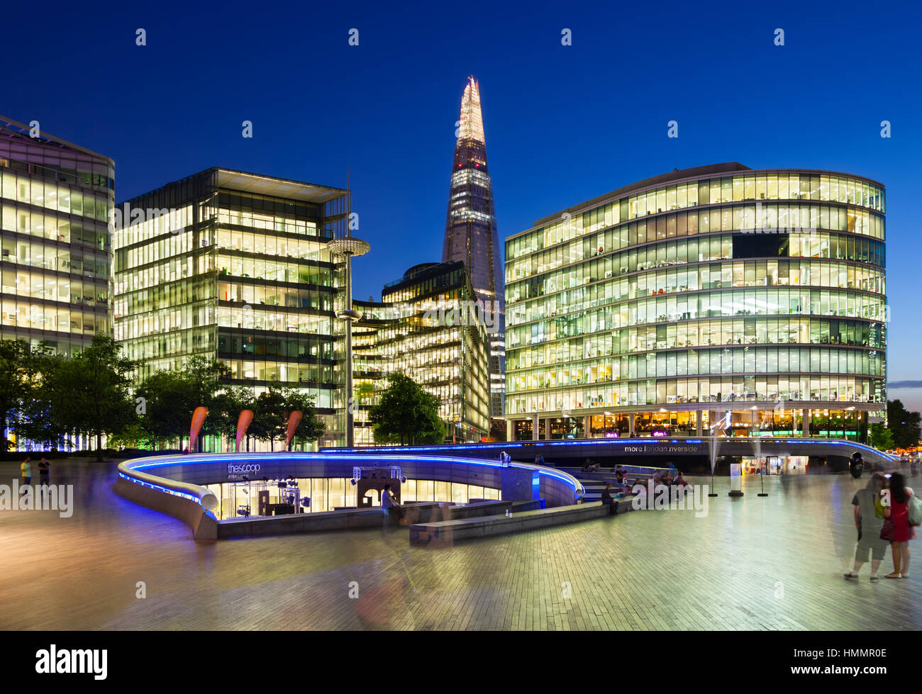 LONDON - AUGUST 20: Night view of several modern glass buildings near ...
