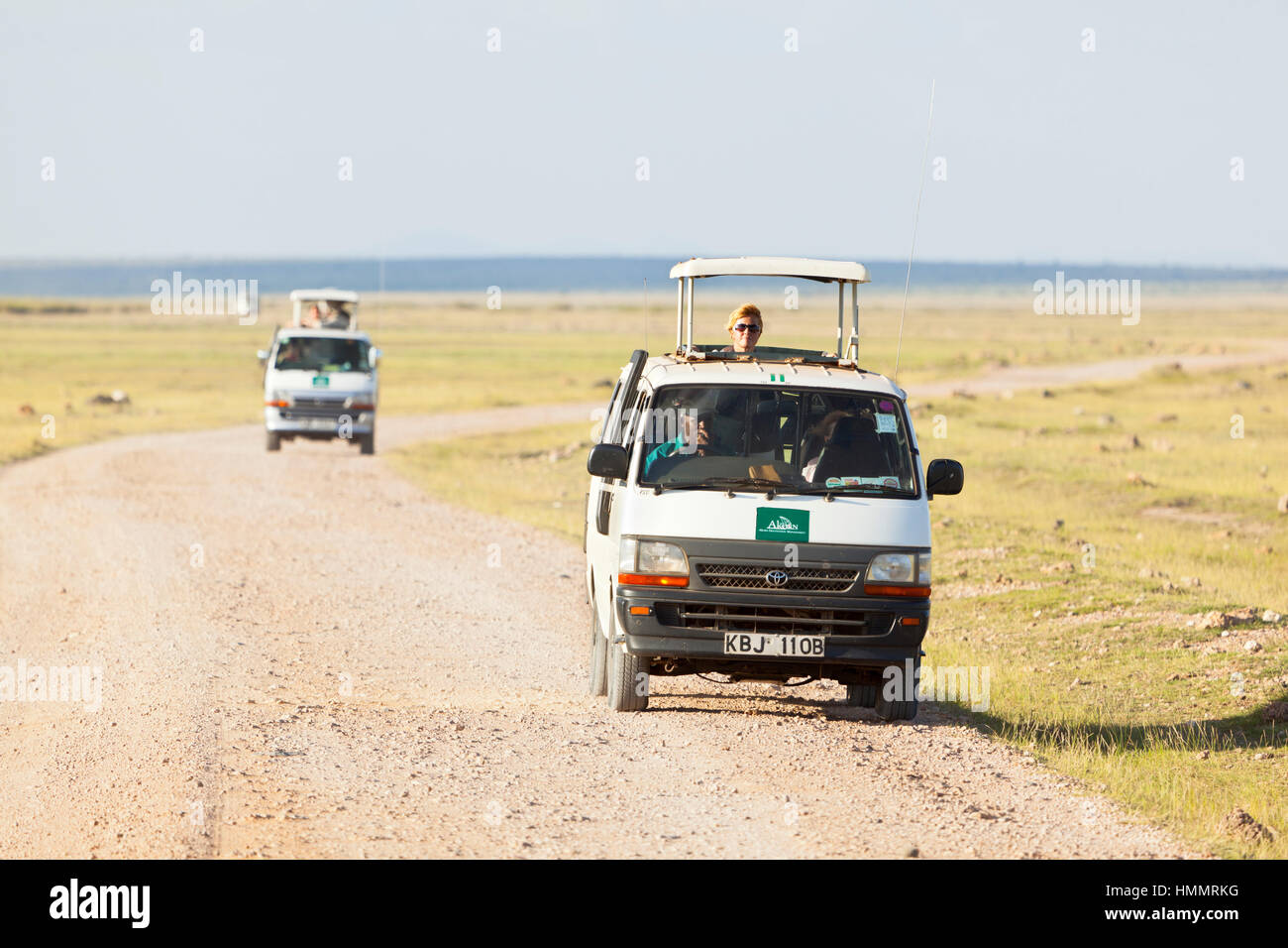 Amboseli, Kenya - February 4: Safari Cars with tourists in Amboseli National Park in Kenya on February 4, 2013 Stock Photo