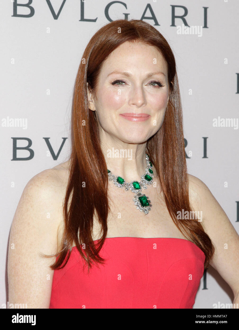 Julianne Moore arrives at the Bulgari Dinner and Celebration of Elizabeth  Taylor's collection of jewels on February 19, 2013 in Beverly Hills,  California. Photo by Francis Specker Stock Photo - Alamy