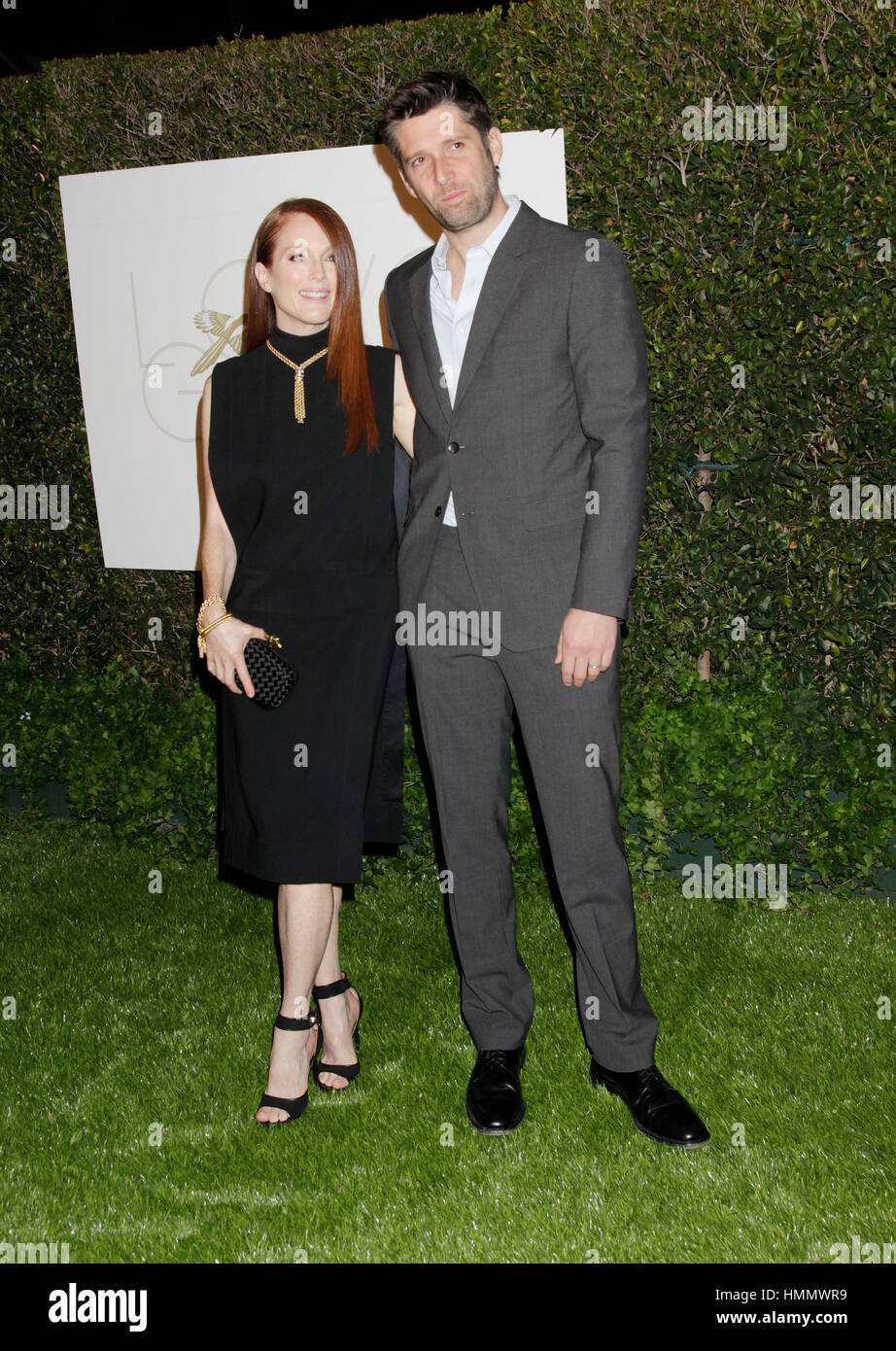 Julianne Moore and Bart Freundlich arrive at the LoveGold Golden Globe