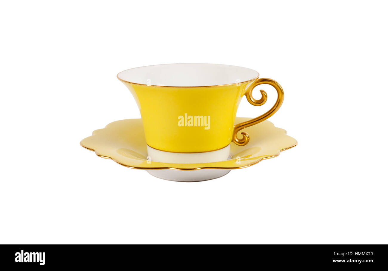 Yellow cup and saucer (isolated Stock Photo Alamy
