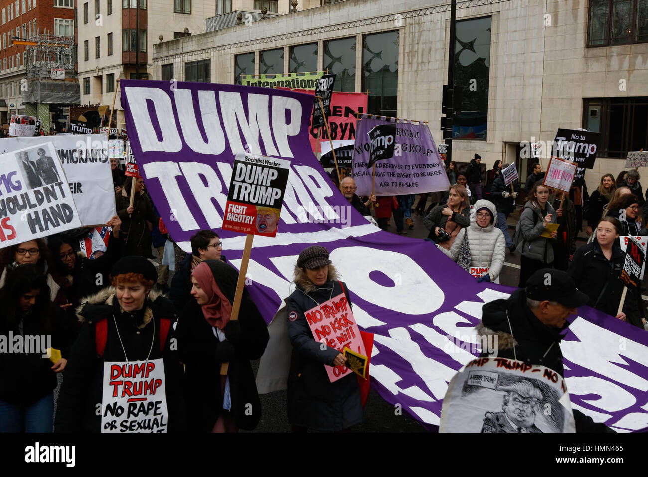 London, UK. 4th February, 2017. Stop Trump's Muslim Ban a big banner on the march Credit: Brian Southam/Alamy Live News Stock Photo