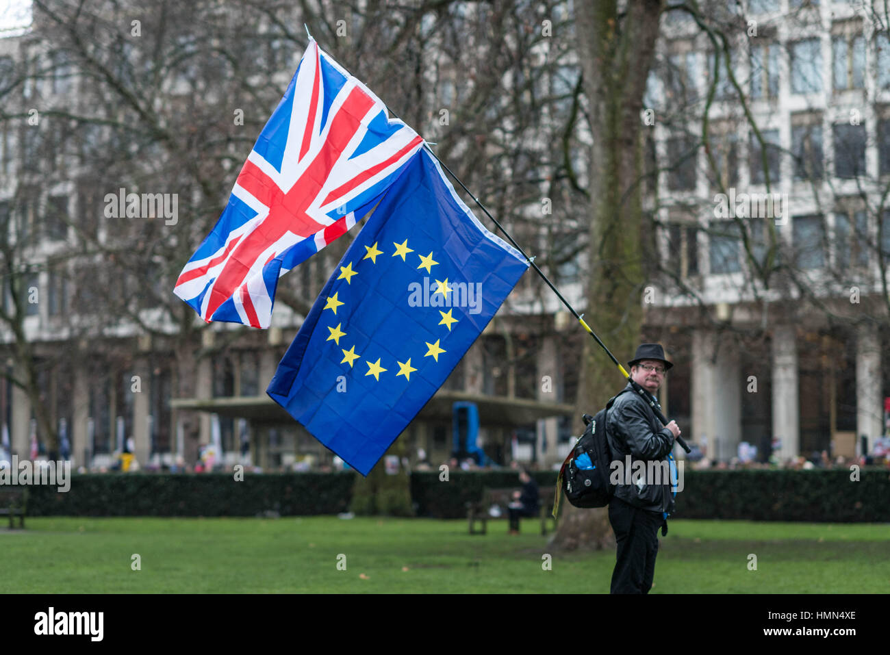 London, UK. 4th February, 2017. Anti-Brexit protester with EU and British flags in Grosvenor Square near US Embassy. © Guy Corbishley/Alamy Live News Stock Photo