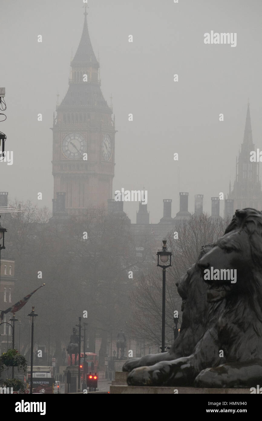 London, UK. 10th Feb, 2017. Low visibility with tall buildings obscured, drizzle and bitter wind in grey central London. Credit: Malcolm Park editorial/Alamy Live News Stock Photo