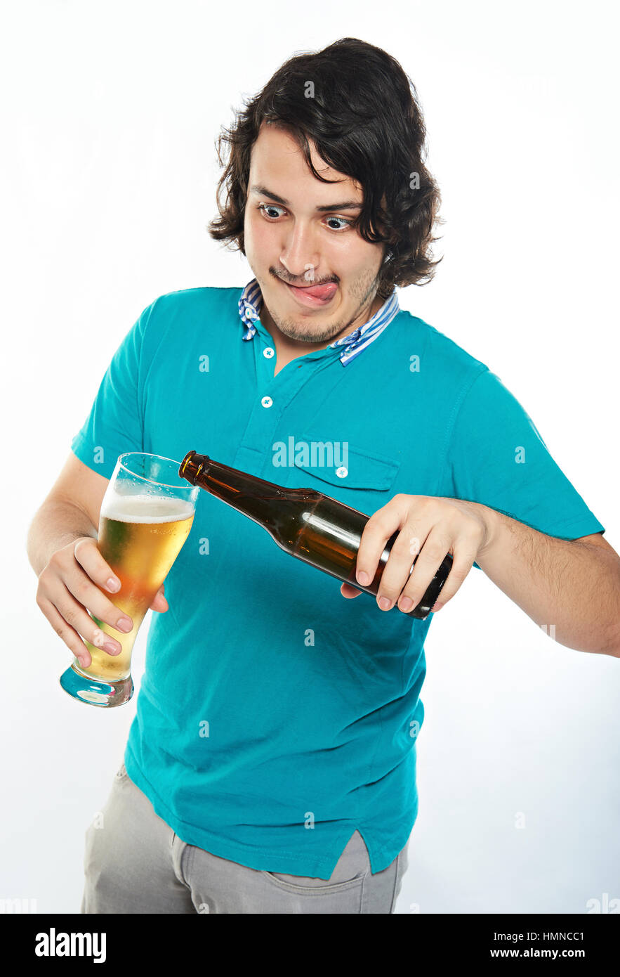 funny man pouring beer in glass isolated on white Stock Photo Alamy